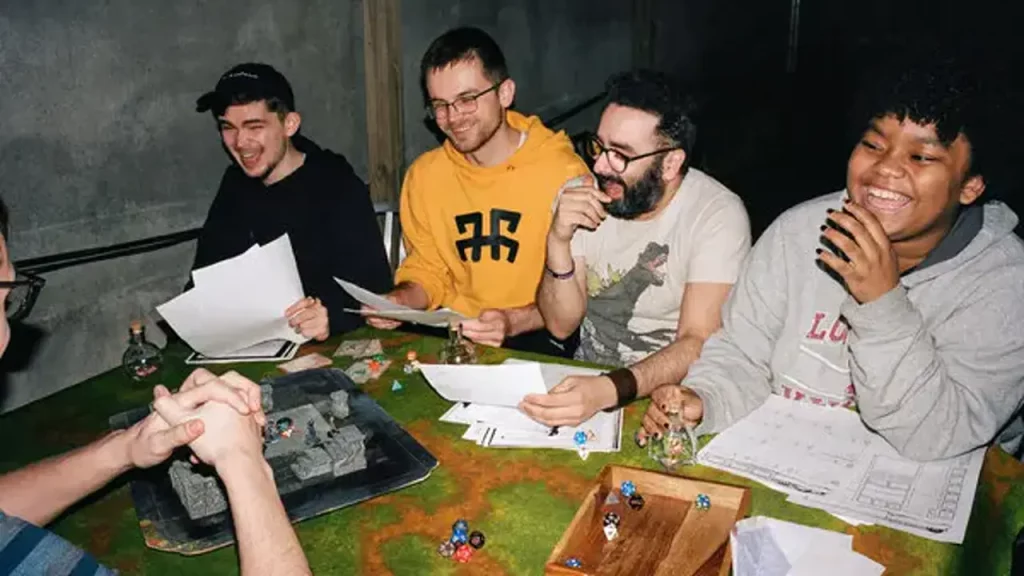 An older photo of people playing Dungeons & Dragons.