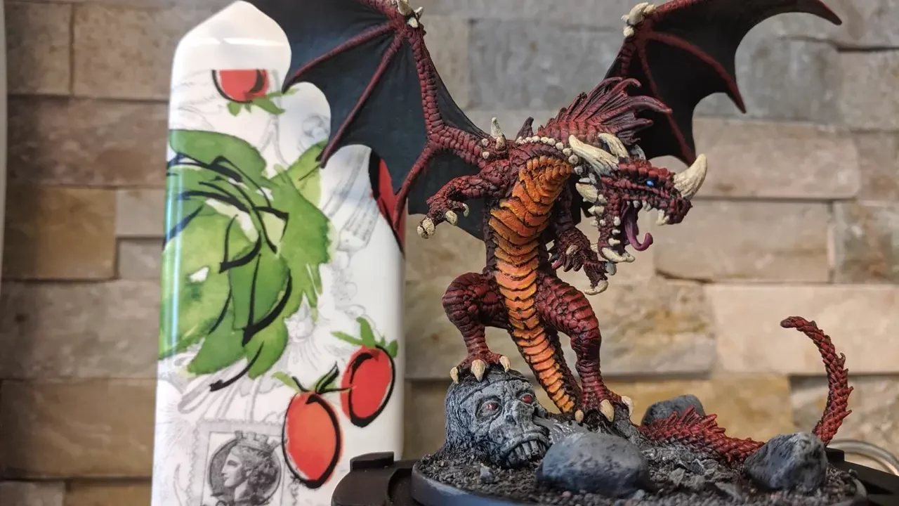 Large metal mini of Pathfinder 2E adult red dragon.