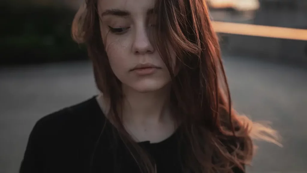 woman-in-black-shirt Woman in black shirt. Themes of social anxiety.