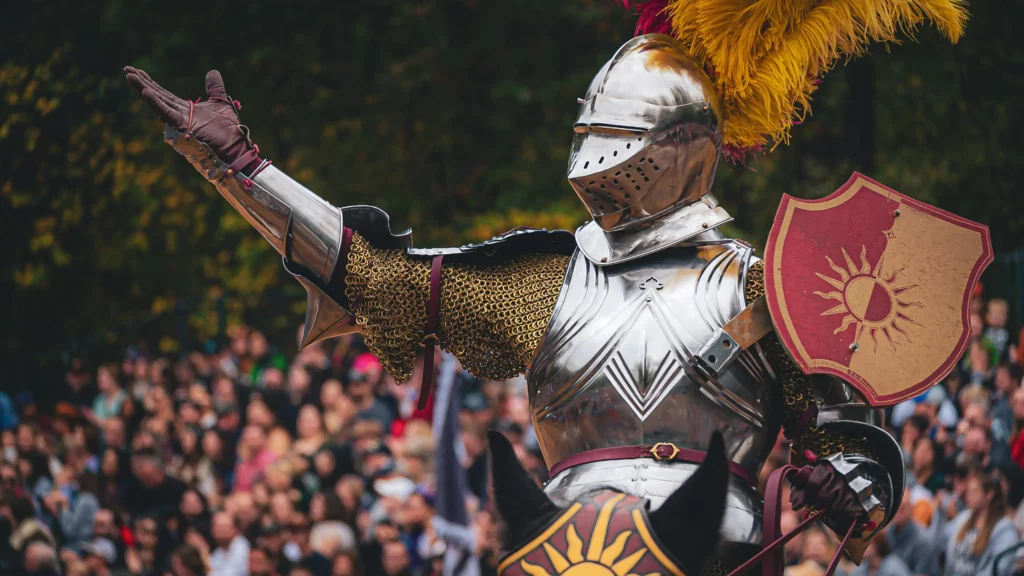 A man dressed in armor and holding a shield