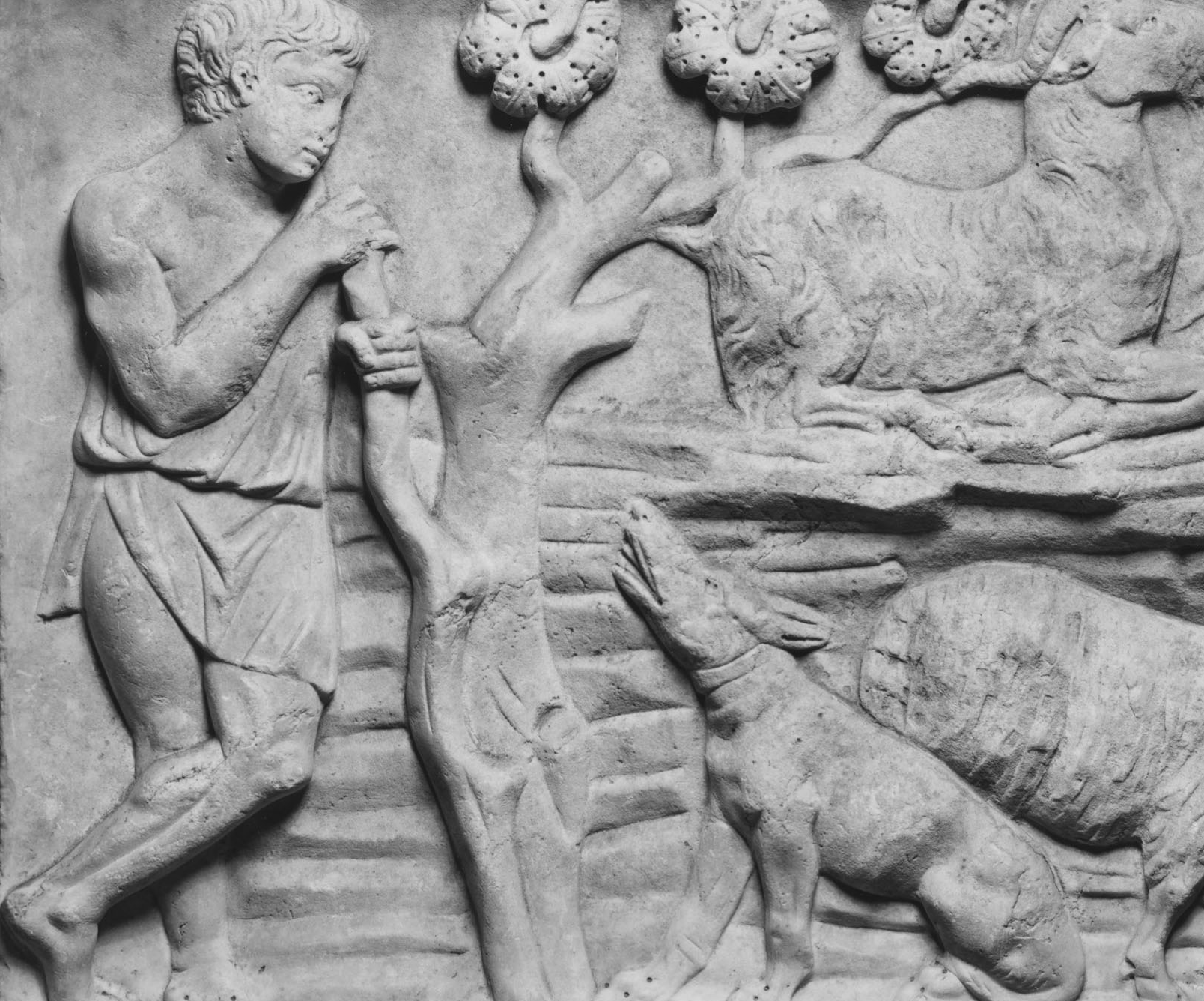 stone-relief-of-dog Stone relief of a dog from Roman times