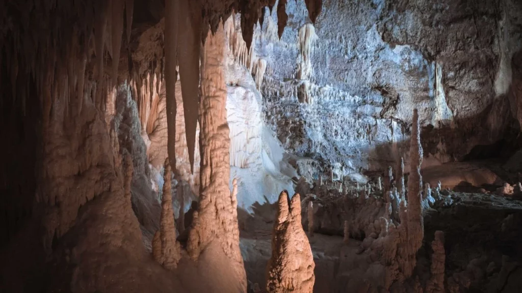 Photo of a cave with stalactites.